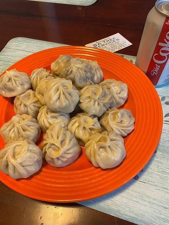 Steam chicken momos served with Nepali chutney at Mustang Thakali Kitchen in San Marcos TX.